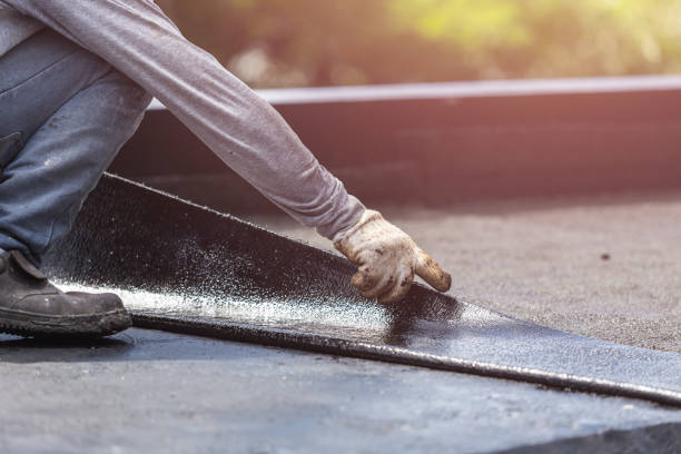 Professional Interior Drainage System technician working in Centereach, NY